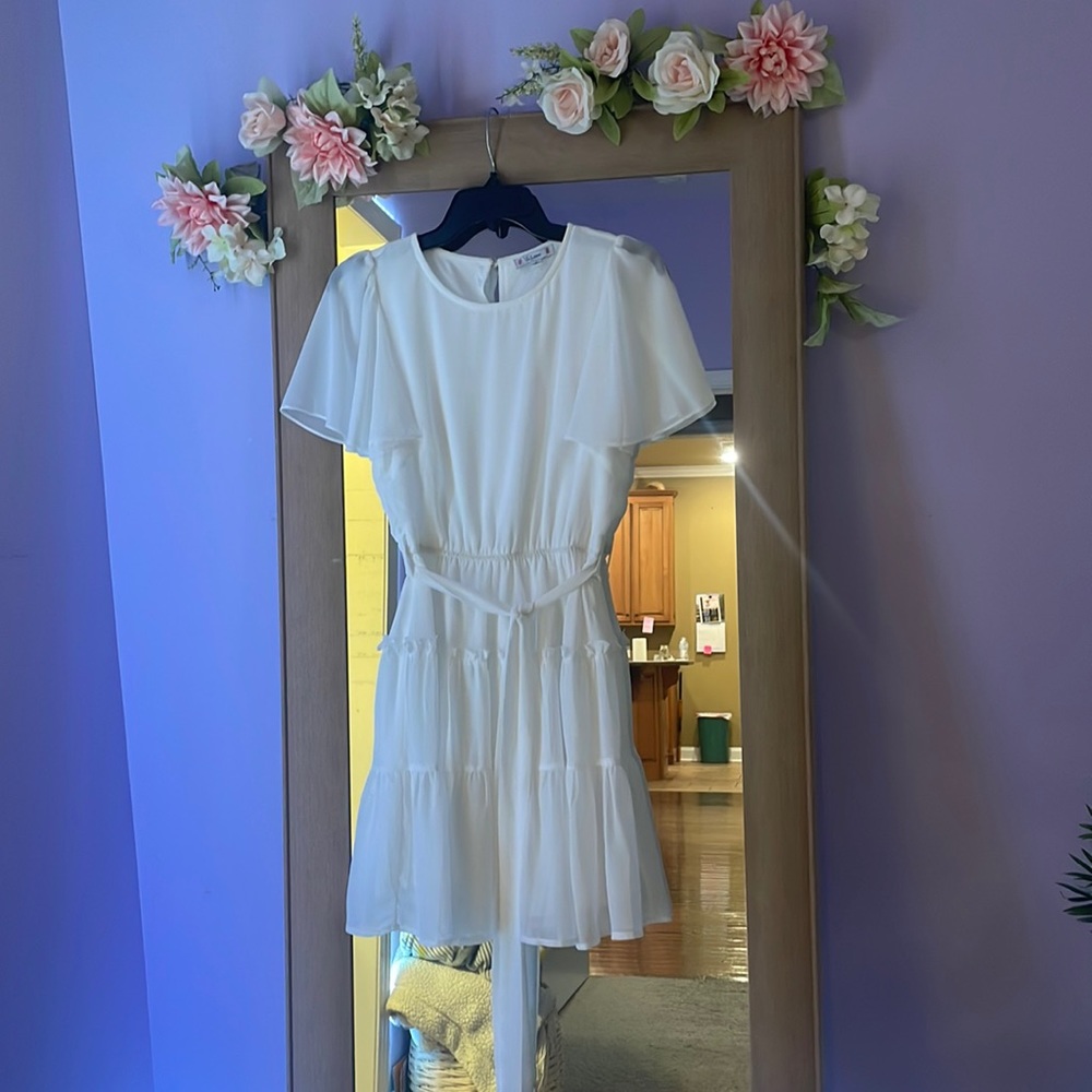 White flowy dress with ruffles